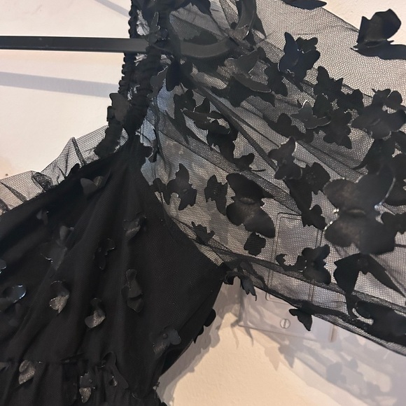 Chic Black Mini Dress with Butterfly Accents - Picture 2 of 6